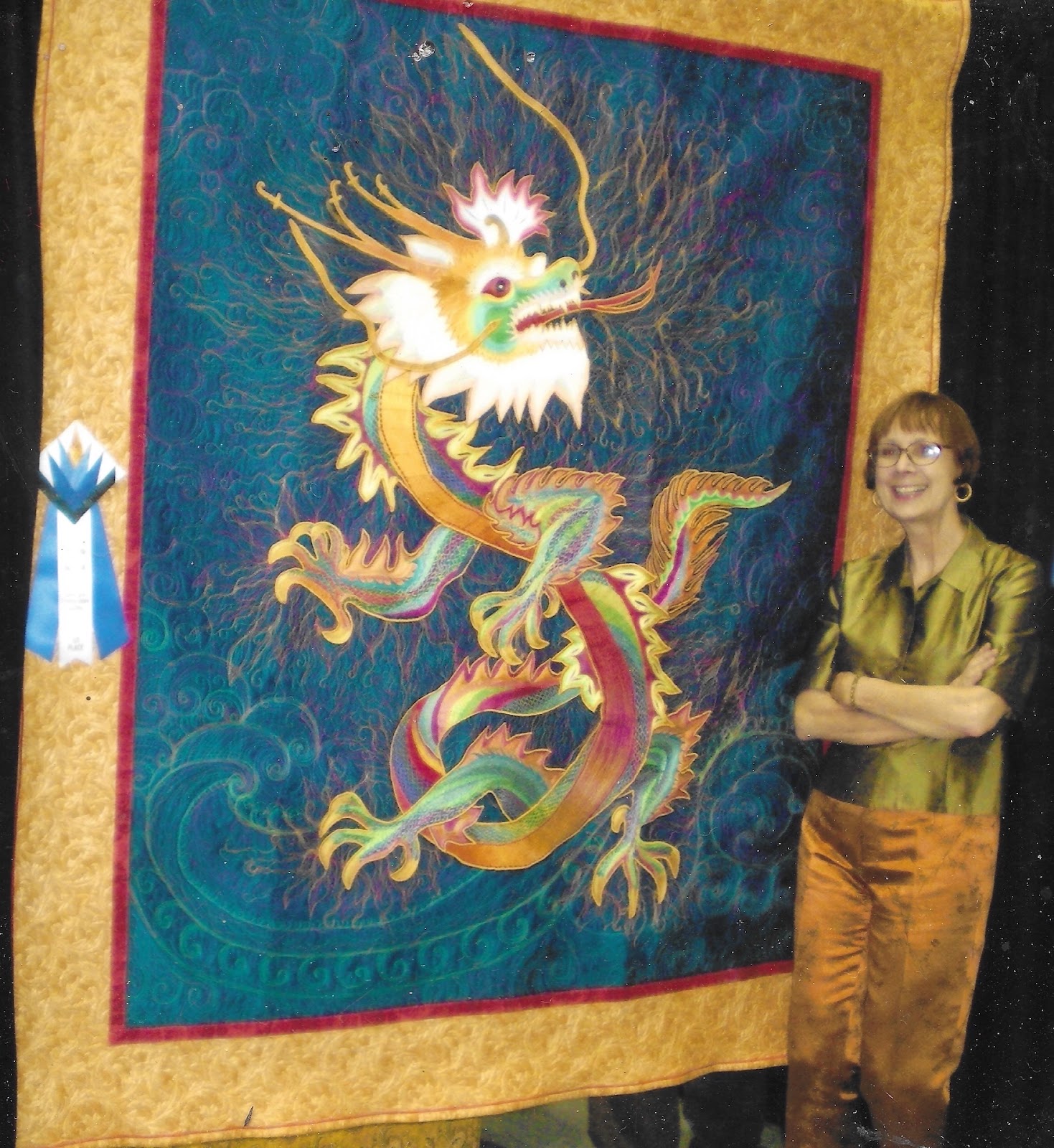 Mary Anne with her dragon quilt, fifteen years ago