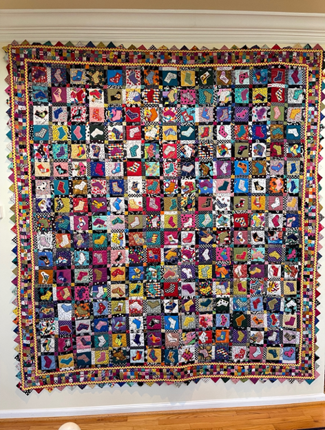Sock Hop, a scrap quilt of 3,500 pieces